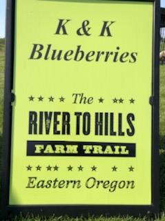 sign that reads K & K Blueberries - The River to Hills Farm Trail - Eastern Oregon