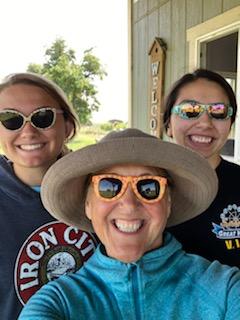 three women wearing sun glasses